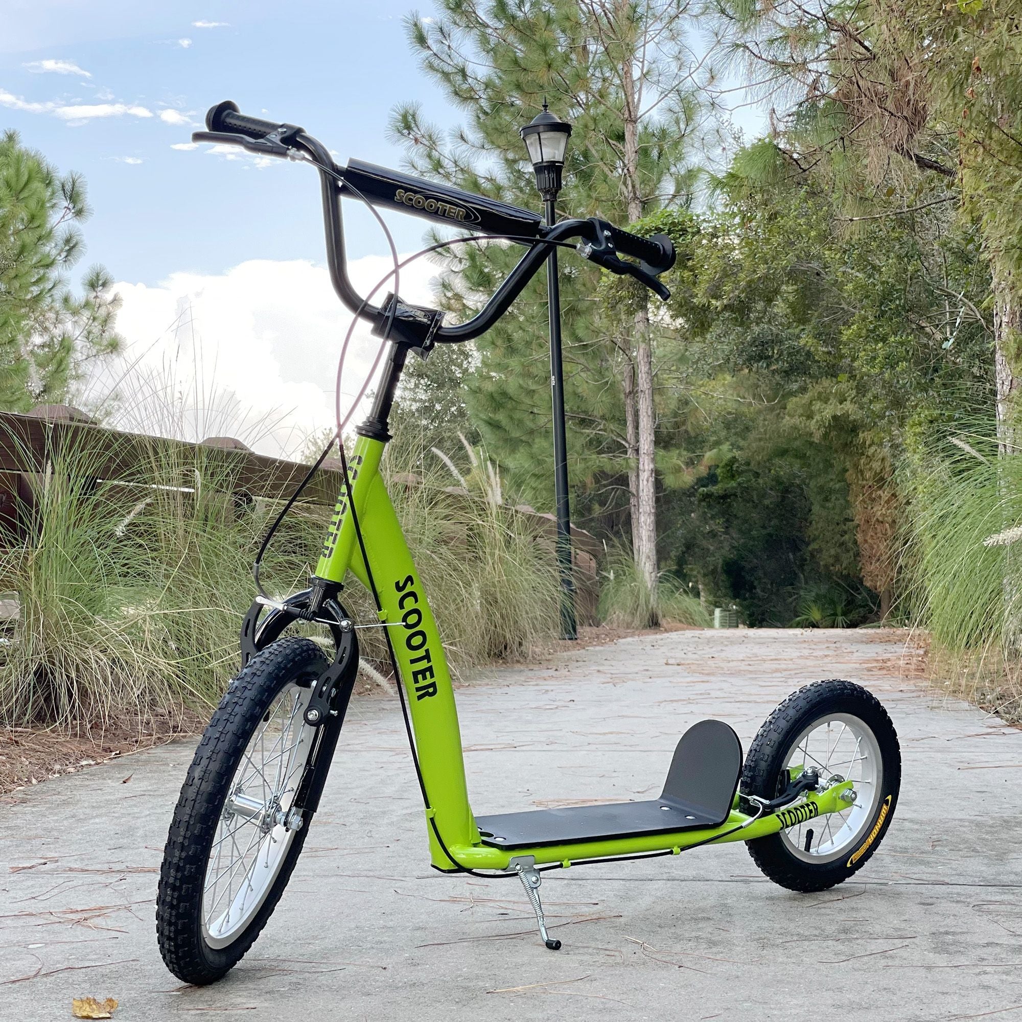 Versatile Green Kick Scooter for Kids 5+ with Inflatable Wheels and Adjustable Height